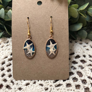 Beach and star fish gold earrings